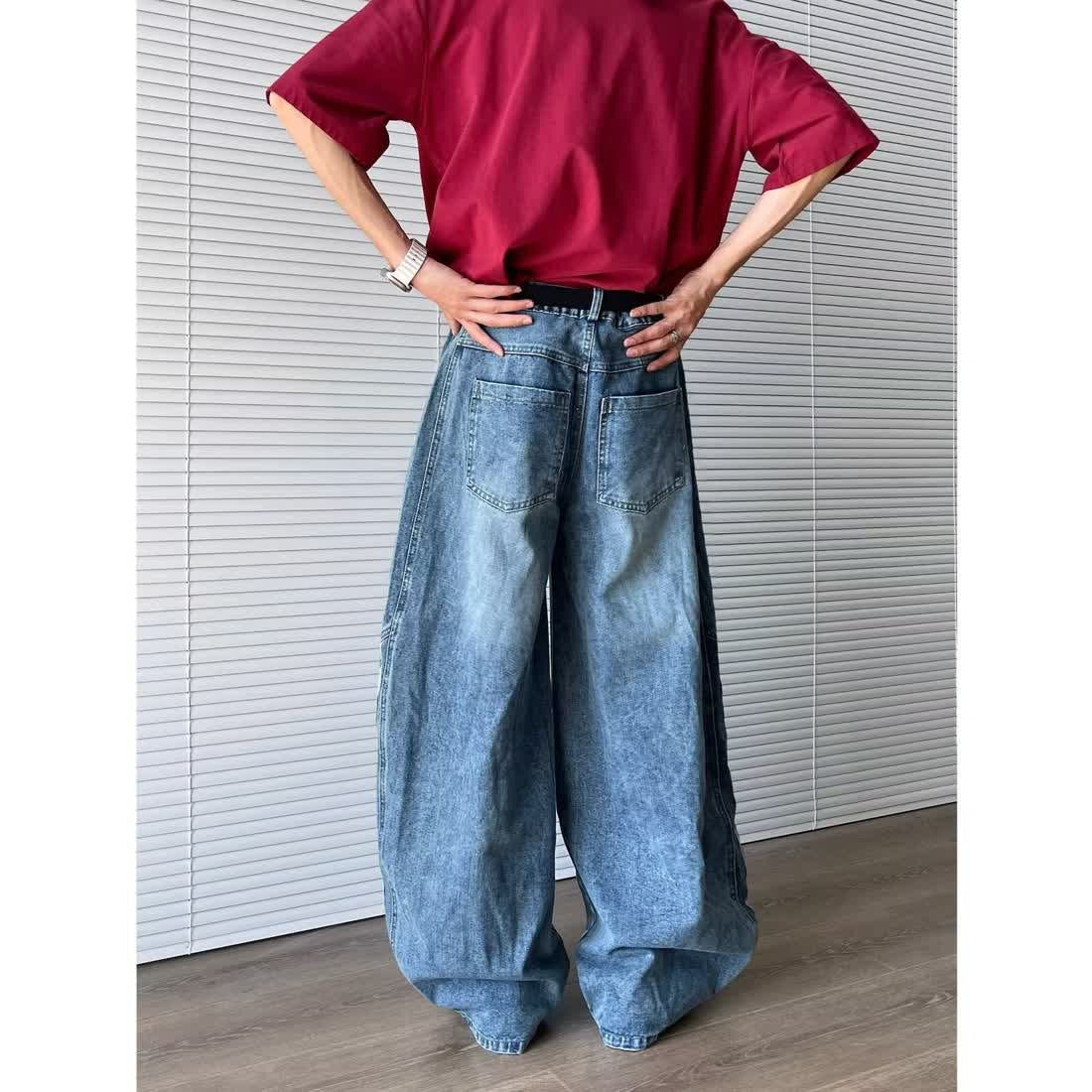 Spring American-style Vintage Washed Deconstructed Bootcut Jeans